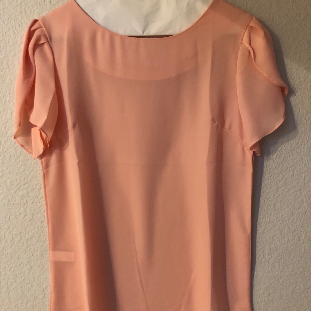 Pink flutter sleeve blouse